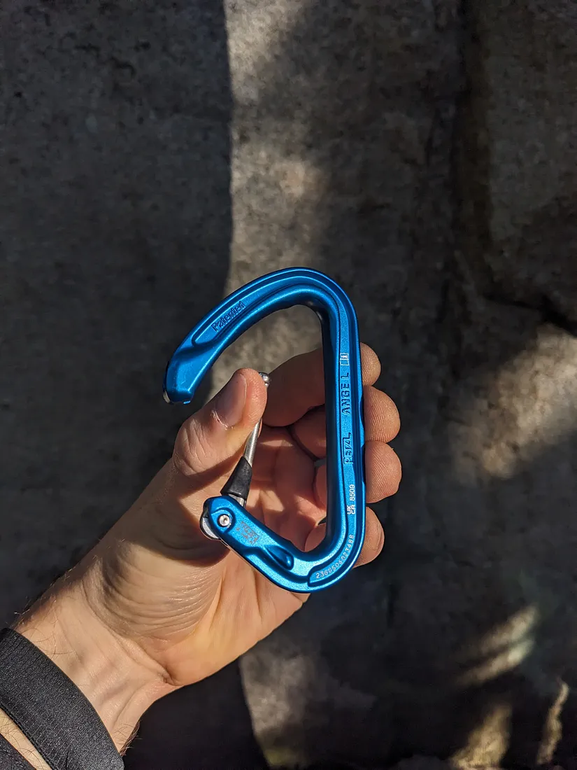 The gate on the Petzl Ange L has a slight notch on the end of the gate for your finger to catch on, which we like